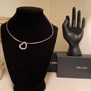 Silver tone necklace with heart pendant​